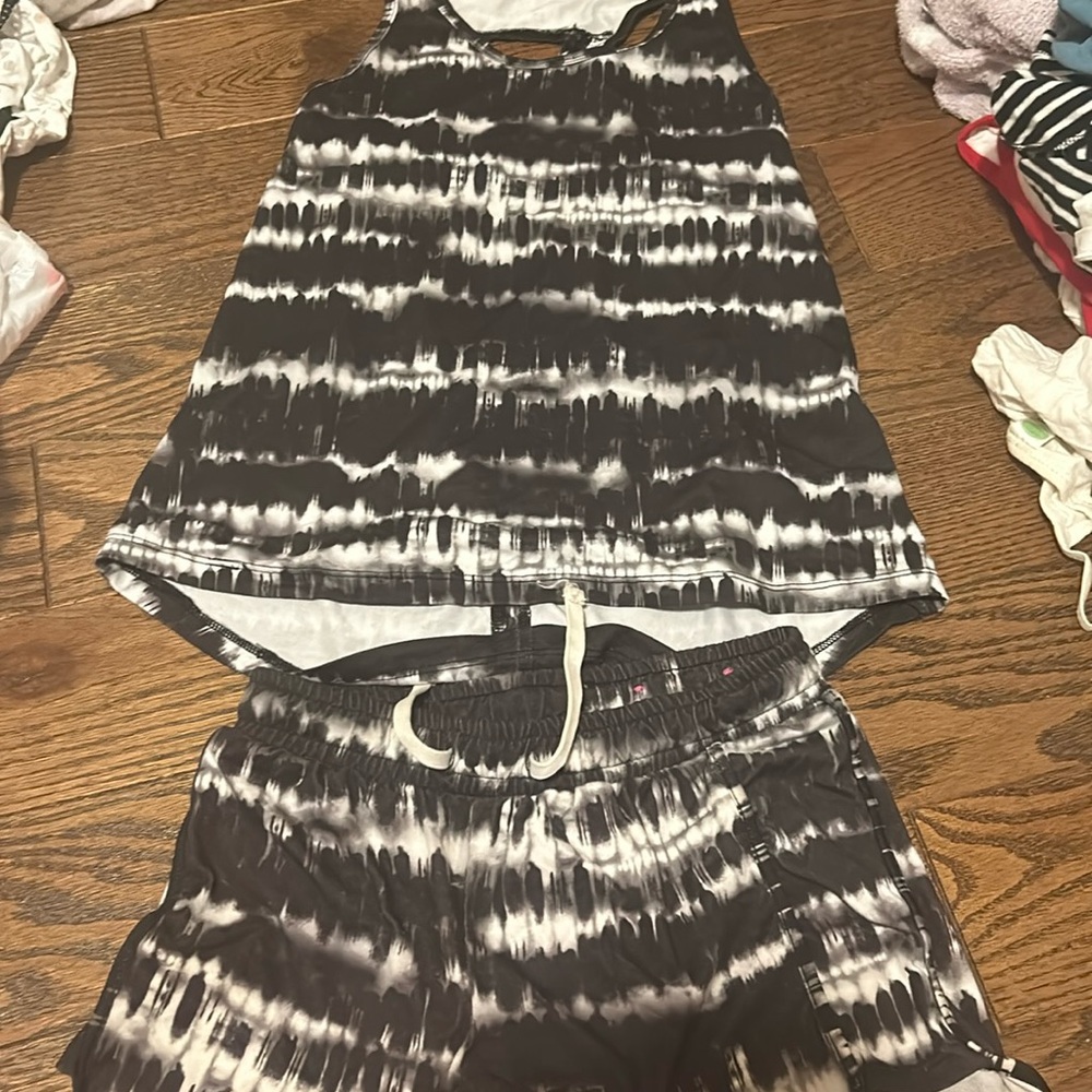 This is a two piece (a top and matching shorts) Athletic wear for 7-8 year olds